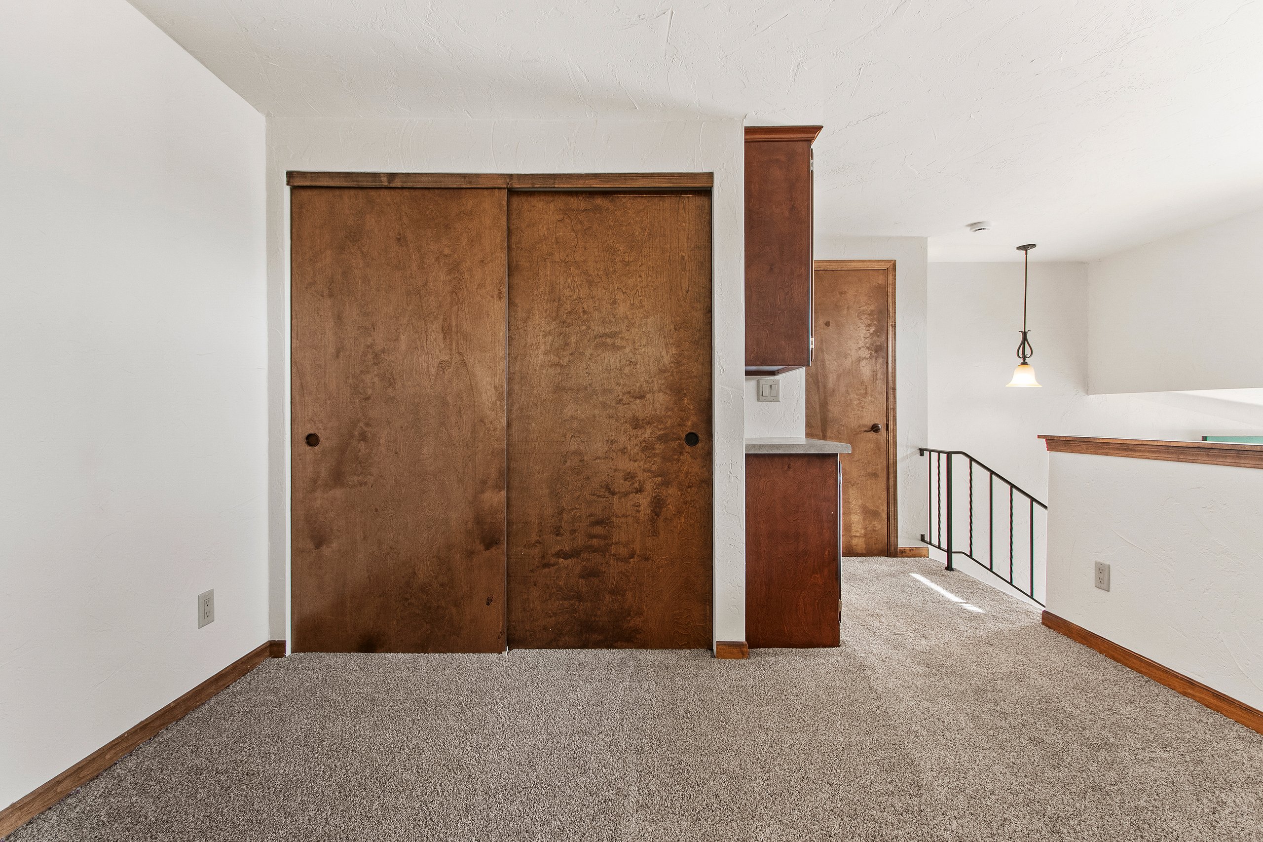 Open two-level interior layout in a representative apartment